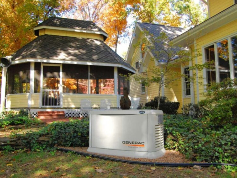 A smiling family standing next to next to their newly installed generator